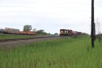 The Kirk Yard west end puller and the CSX transfer slowly roll east side by side